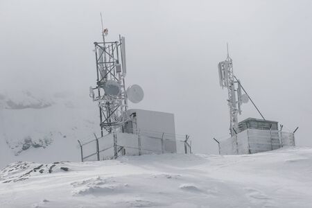 SIBIU, ROMANIA - March 13, 2010: Telecomunications station covered in snow in the monutainsのeditorial素材