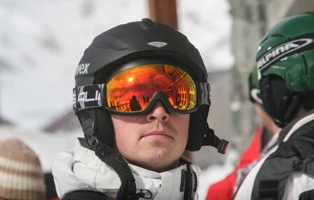 SIBIU, ROMANIA - March 13, 2010: Portrait of a male skier at Balea lake, Fagaras mountains.のeditorial素材