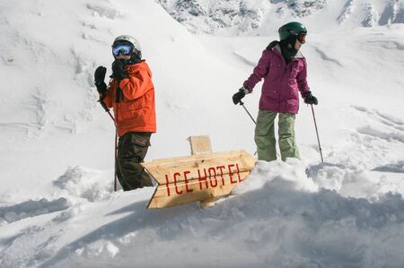 SIBIU, ROMANIA - March 13, 2010: Snowboard and skiers at the Ice hotel, Balea lake, Fagaras mountains.のeditorial素材