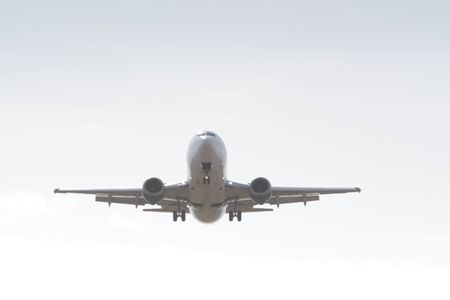 BUCHAREST, ROMANIA - August 15, 2017: Airplane in the cloudy sky.のeditorial素材
