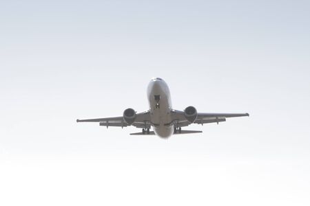 BUCHAREST, ROMANIA - August 15, 2017: Airplane in the cloudy sky.のeditorial素材