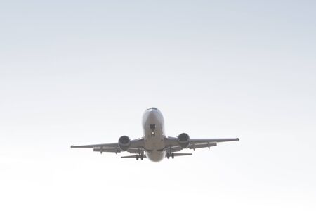 BUCHAREST, ROMANIA - August 15, 2017: Airplane in the cloudy sky.のeditorial素材