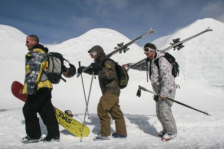 SIBIU, ROMANIA - March 13, 2010: Group of skiers and snowboarders at the Balea lake.のeditorial素材