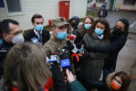 BUCHAREST, ROMANIA - Dec. 27, 2020: Doctor Valeriu Gheorghita, the coordinator of the nationwide COVID-19 vaccination campaign, speaks to press during the first day of European Vaccination Campaign.のeditorial素材