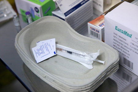 BUCHAREST, ROMANIA - Dec. 27, 2020: A medical cabinet used to administer a dose of the Pfizer-BioNTech COVID-19 vaccine during the first day of European Vaccination Campaign.のeditorial素材