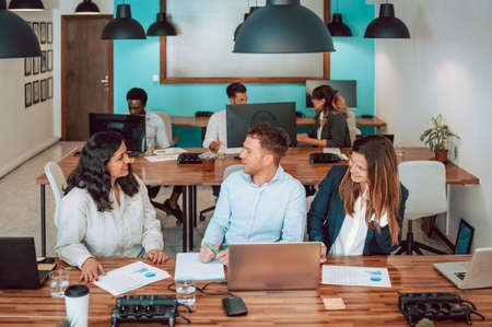 Colleagues working together in office
