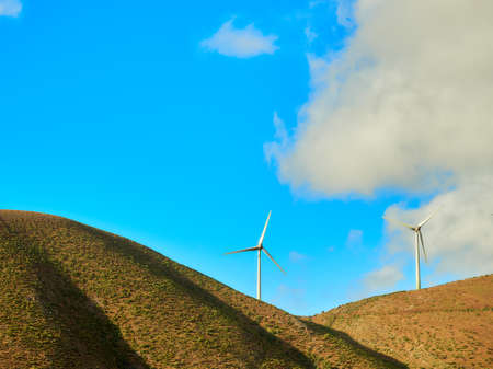 renewable, energy, wind, power, plant, windmills, mountain, nature, middle, turbine, windmill, change, earth, environmental, ecology, electricity, heating, green, wind turbines, environment, alternative, landscape, electric, technology, carbon, climate, conservation, development, dioxide, field, generate, efficiency, generation, global, industry, industrial, production, rotate, resource, sky, sustainable, wind-turbine, propeller, windpower, wind farm, generator, molino, electricalの写真素材