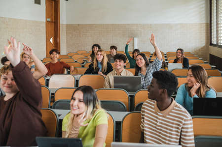Students wishing to answer questionの写真素材