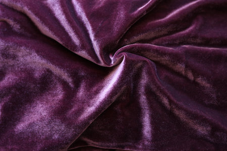burgundy colored velvet fabric textureの写真素材