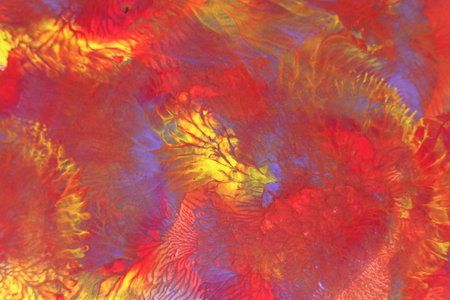 Abstract background of acrylic paint in red, blue and yellow tones.の写真素材
