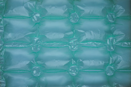 Close up of green plastic bubble wrap texture background. Use for background or wallpaper