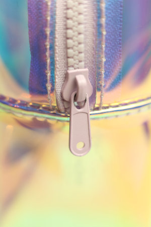 Zipper on a holographic bag, close upの写真素材