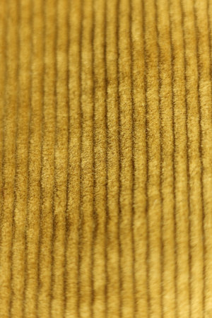 Close-up of beige fabric texture background. Macro photo of textile material.の写真素材
