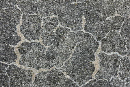 Cracked concrete wall background. Close-up of cracked concrete texture.の写真素材