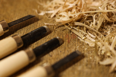 Woodworking tools on a wooden table with sawdust. Close-up.の写真素材