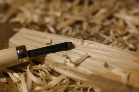 Woodworking tools on a wooden table with sawdust. Close-up.の写真素材
