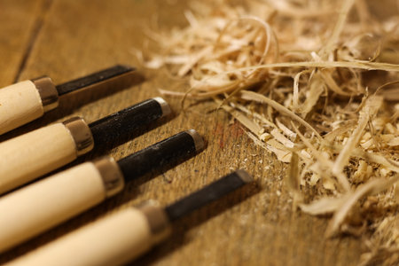 Woodworking tools on a wooden table with sawdust. Close-up.の写真素材