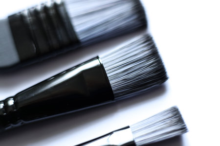 Paint brushes on a white background. Close-up photo.の写真素材