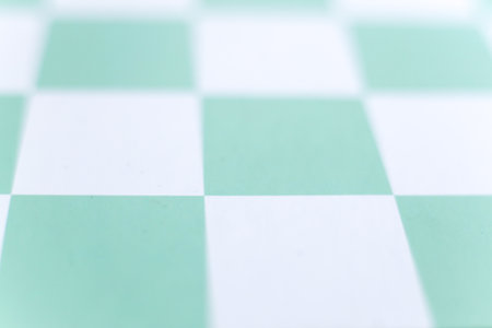 Green and white checkerboard background. Shallow depth of field.の写真素材