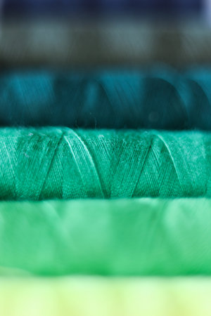 Close up of colorful thread spools. Shallow depth of field.