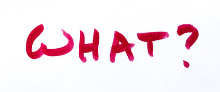 Handwritten word âWhat?â written in red ink or marker on a clean white background. Minimalist composition expressing confusion, questioning, doubt, curiosity, or surprise.の写真素材