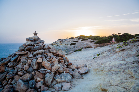 Sunset view on the footpath of the Algarve coast near to Carvoeiro, Portugalの写真素材