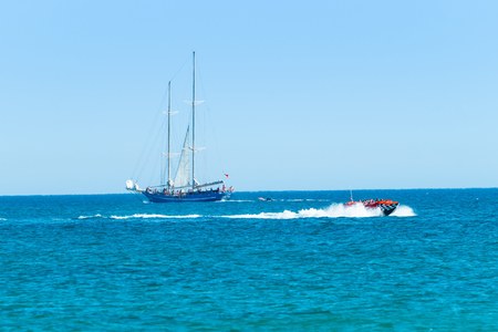 Speed boat or jet boat ride experience by the coasts of Albufeira, Algarve Portugal.のeditorial素材
