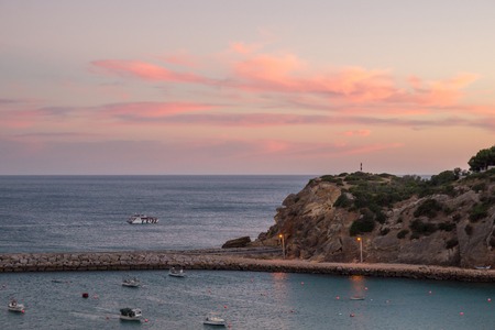 Sunset over the Porto de Abrigo de Albufeira, Albufeira Bay in Albufeira, Portugal.のeditorial素材