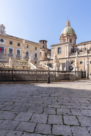 The Pretoria Fountain (Fontana Pretoria) with the dome of Santa Caterina. The fountain represents mythological figures and animals in Palermo, Sicily, Italyのeditorial素材