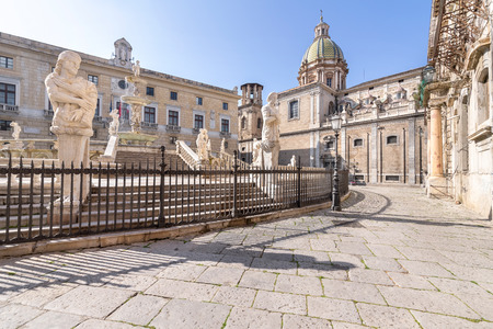 The Pretoria Fountain (Fontana Pretoria) with the dome of Santa Caterina. The fountain represents mythological figures and animals in Palermo, Sicily, Italyのeditorial素材