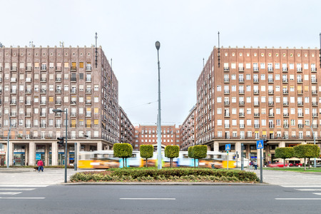 Budapest, Hungary - November 01, 2018: Madach Square or MadÃ¡cs TÃ©r, building complex and street view with 49, 47 yellow vintage tram passing by on a sunny afternoon in Budapest, late Autumn.のeditorial素材