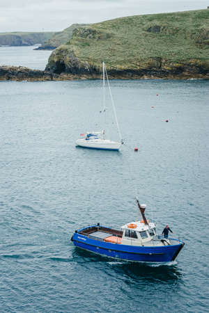 Skomer Island, Wales - July 1, 2017: Dale Princess empty boat ride to pick up people on a cloudy summer day - Martin's Haven Pembrokeshire UKのeditorial素材