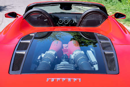 BUDAPEST, HUNGARY - May 11, 2021: Ferrari F430 - Spider, Italian sports car interior designed by Pininfarina, photographed by GellÃ©rt Hill lookout point, with the panorama of Budapest.のeditorial素材