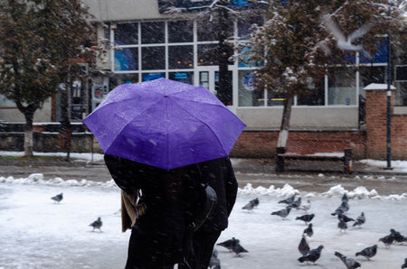 <p>Cold weather. Unidentified people walk on the street in Botosani, Romania</p>の写真素材