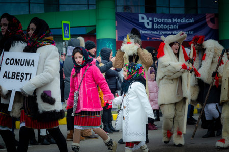 The Carnival at Botosani, Romania in the year 2023. The picture shows some costumed people.のeditorial素材