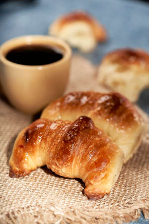 coffee with croissants for breakfastの写真素材