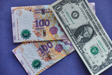 one dollar equals 200 argentine pesos, exchange rate 2021 devaluation. blue dollarの写真素材