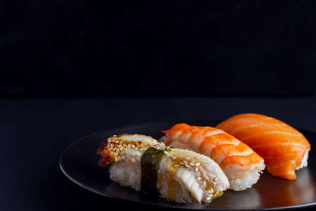 Japanese seafood sushi on black backgroundの写真素材