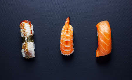 Japanese seafood on dark background. Sushi Set.の写真素材
