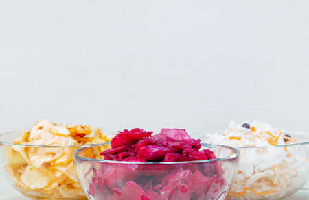 Korean kimchi cabbage, beet sauerkraut and sauerkraut in glass bowl. Probiotics food concept.の写真素材