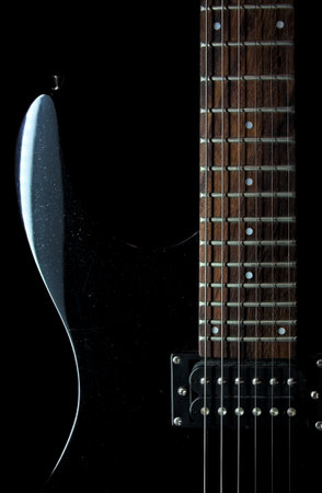 Electric guitar on a black background.
