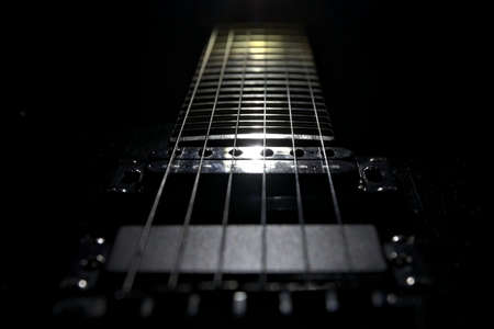 Electric guitar on a black background.の写真素材