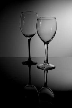 Glass wine glasses, on a black and white background.の写真素材