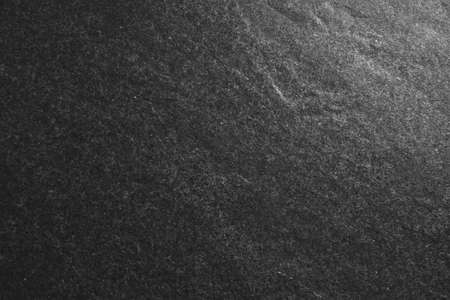 Gray granite slab with a clear structure. Natural gray stone.の写真素材