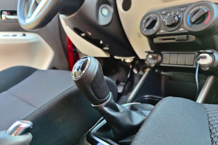 Passenger car interior. Gear shift knob and car upholstery.の写真素材