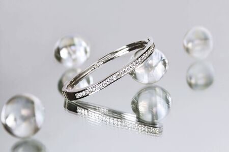 Diamond bracelet among glass beadsの写真素材