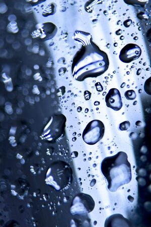 Closeup of water drops on wet glassの写真素材