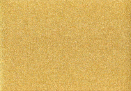 Gold metallic foil with linen cloth texture for decorative backgroundの写真素材