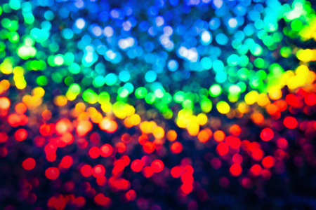 Bokeh glittering shine bulbs lights background:blur of Christmas wallpaper decorations concept.holiday festival backdrop:sparkle circle lit celebrations displayの写真素材