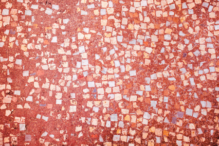 Closeup of trendy coloured living coral, orange and dark red abstract mosaic ceramic tiles patterned backgroundの写真素材